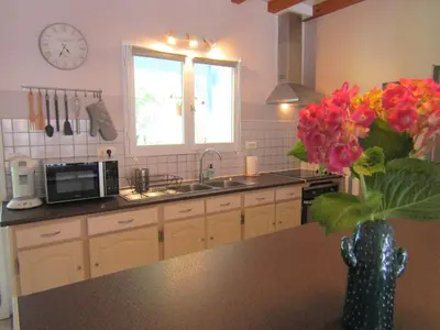 Cuisine ou kitchenette dans l'établissement Gîte de Marcadé