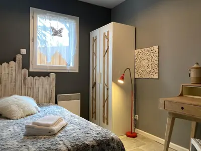Un ou plusieurs lits dans un hébergement de l'établissement Appartement-Charme & Confort-Proche Parc Ornithologique-Dune du Pilat- Clim- Parking privé