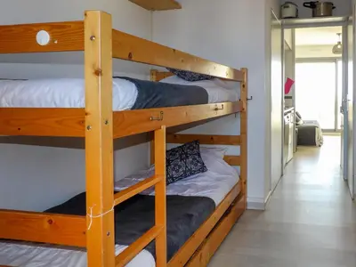Un ou plusieurs lits dans un hébergement de l'établissement Apartment Grand Pavois-4 by Interhome
