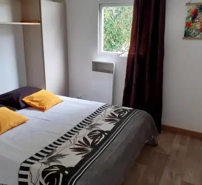 Un ou plusieurs lits dans un hébergement de l'établissement Chalet
