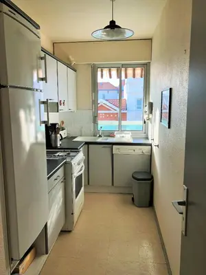 Cuisine ou kitchenette dans l'établissement JARDIN 308 Appartement avec Terrasse et Parking