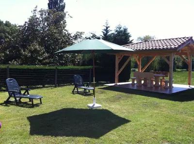 Jardin de l'établissement Grande maison de vacances