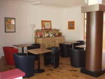 Coin salon dans l'établissement Les Pavillons du Rooy