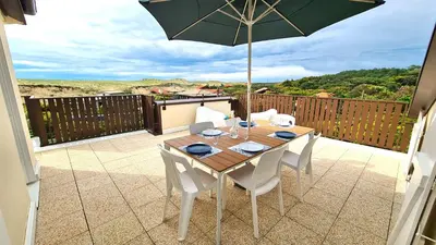 Balcon ou terrasse dans l'établissement Appartement duplex 5 personnes, vue sur la dune #0295