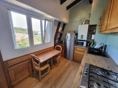 Cuisine ou kitchenette dans l'établissement Appartement duplex 5 personnes, vue sur la dune #0295