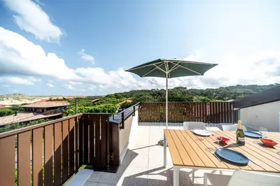 Balcon ou terrasse dans l'établissement Appartement duplex 5 personnes, vue sur la dune #0295