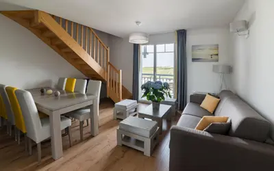 Coin salon dans l'établissement Lagrange Vacances Les Balcons de l'Océan
