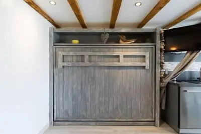 Cuisine ou kitchenette dans l'établissement PETIT COIN DE CHARME