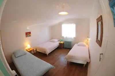 Un ou plusieurs lits dans un hébergement de l'établissement La villa tamaris maison à partager