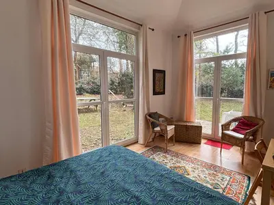 Un ou plusieurs lits dans un hébergement de l'établissement Villa 3 ch, proche lac et océan, au calme, animaux admis - FR-1-319-371