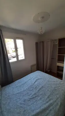 Un ou plusieurs lits dans un hébergement de l'établissement Appartement à deux pas de l ocean