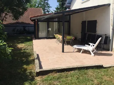 Jardin de l'établissement Maison spacieuse tout confort 10 personnes