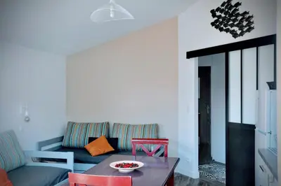 Coin salon dans l'établissement La Hume Vacances