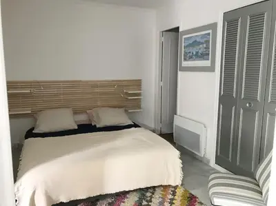 Un ou plusieurs lits dans un hébergement de l'établissement Appartement calme et familial au Centre d'Hossegor