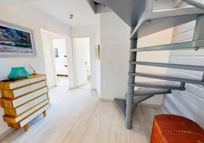 Un ou plusieurs lits dans un hébergement de l'établissement AIRIAL - Grand Appartement de standing en centre-ville
