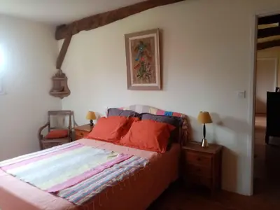 Un ou plusieurs lits dans un hébergement de l'établissement Ricouch, chambre d'hôtes et permaculture