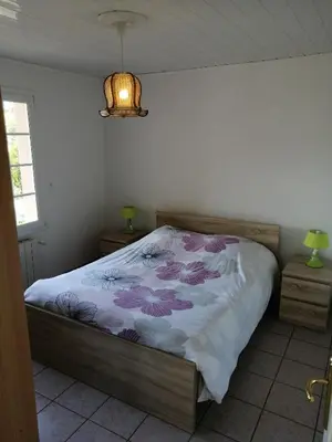 Un ou plusieurs lits dans un hébergement de l'établissement CHEZ MARTINE Appt climatisé 2 Chambres