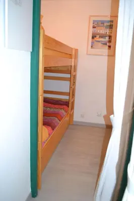 Un ou plusieurs lits dans un hébergement de l'établissement Appartement à 50m de la plage
