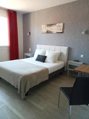 Un ou plusieurs lits dans un hébergement de l'établissement L'Auberge de Lugos