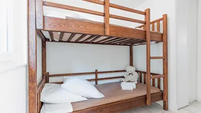 Un ou plusieurs lits dans un hébergement de l'établissement Madame Vacances Les Rives Marines