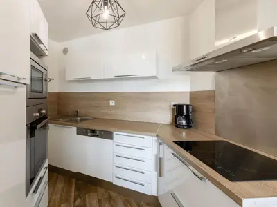 Cuisine ou kitchenette dans l'établissement Apartment le Grand Foc-1 by Interhome