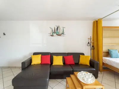 Coin salon dans l'établissement Apartment le Grand Foc-1 by Interhome