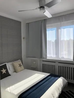Un ou plusieurs lits dans un hébergement de l'établissement Hôtel du Lac d'Arjuzanx