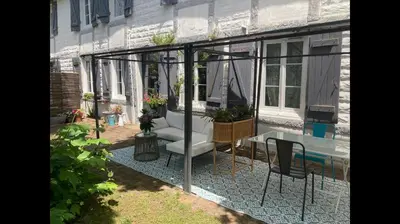 Balcon ou terrasse dans l'établissement Gîte avec jacuzzi privatif à proximité de l'océan