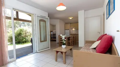 Cuisine ou kitchenette dans l'établissement Vacancéole - L'Allée des Dunes - Ondres Plage