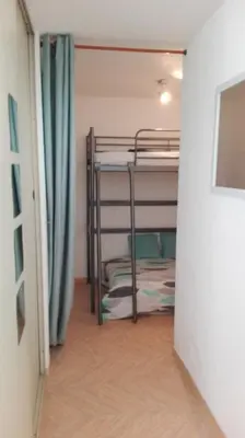 Un ou plusieurs lits dans un hébergement de l'établissement appartement T2bis idealement situé au bord du lac marin de Vieux Boucau