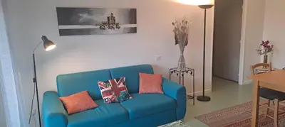 Coin salon dans l'établissement Appart T3 central calme proche Thermes pour cures/vacances