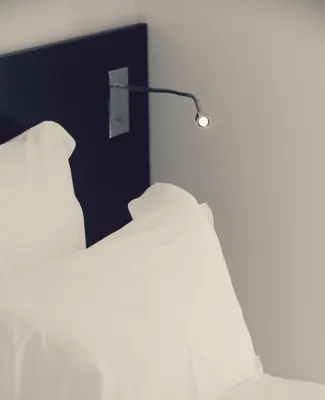 Un ou plusieurs lits dans un hébergement de l'établissement Le Grand Hotel de la Plage