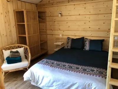 Un ou plusieurs lits dans un hébergement de l'établissement La petite ferme de Pouillon - Parc animalier - aire de loisirs