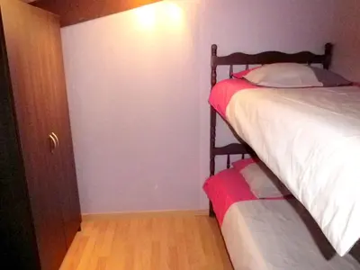 Un ou plusieurs lits dans un hébergement de l'établissement Villa en pleine nature à Escource avec piscine privée