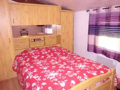Un ou plusieurs lits dans un hébergement de l'établissement Villa en pleine nature à Escource avec piscine privée