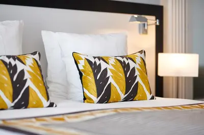 Un ou plusieurs lits dans un hébergement de l'établissement Hotel & Spa Vacances Bleues Le Splendid