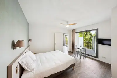 Un ou plusieurs lits dans un hébergement de l'établissement All Suites Appart Hôtel - Bassin d'Arcachon - Dune du Pilat