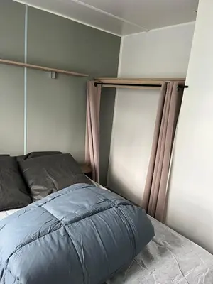 Un ou plusieurs lits dans un hébergement de l'établissement Mobil home Les dunes de contis