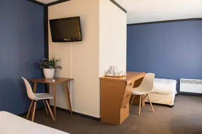 Télévision ou salle de divertissement dans l'établissement Hotel de Jouvence