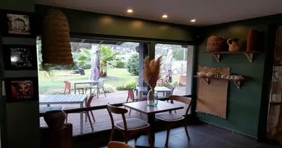 Cuisine ou kitchenette dans l'établissement Les Jardins de L'Ocean - Climatisé