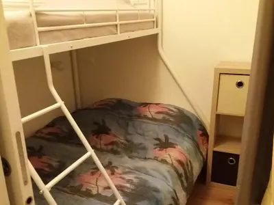 Un ou plusieurs lits dans un hébergement de l'établissement Appartement T3 avec piscine, sauna en front de mer à Biscarrosse Plage - FR-1-521-1