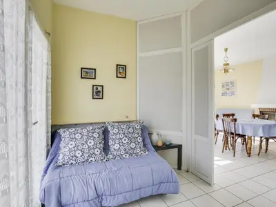 Un ou plusieurs lits dans un hébergement de l'établissement Villa 2 chambres proche plage, jardin, véranda, clim, wifi à Biscarrosse - FR-1-521-19