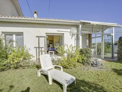 Jardin de l'établissement Villa 2 chambres proche plage, jardin, véranda, clim, wifi à Biscarrosse - FR-1-521-19