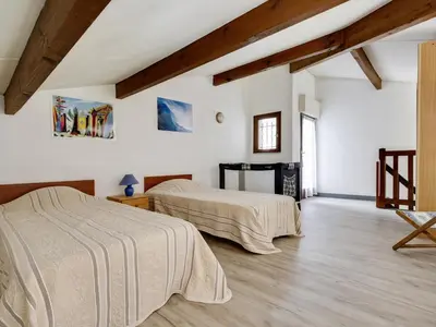 Un ou plusieurs lits dans un hébergement de l'établissement Maison 5 pers. à Biscarrosse - Calme, proche plages, jardin, terrasse, parking - FR-1-521-25
