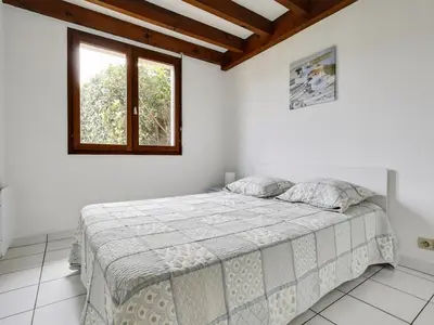 Un ou plusieurs lits dans un hébergement de l'établissement Maison 5 pers. à Biscarrosse - Calme, proche plages, jardin, terrasse, parking - FR-1-521-25
