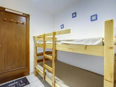 Un ou plusieurs lits dans un hébergement de l'établissement Studio cabine 4 pers. - à 300m des plages - terrasse et parking privé - FR-1-521-39