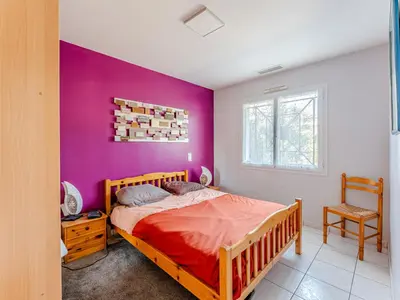 Un ou plusieurs lits dans un hébergement de l'établissement Maison 6 pers, jardin clos, calme, proche plage, animaux admis, parking, WIFI - FR-1-521-65