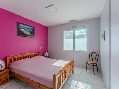 Un ou plusieurs lits dans un hébergement de l'établissement Maison 6 pers, jardin clos, calme, proche plage, animaux admis, parking, WIFI - FR-1-521-65