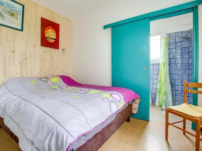 Un ou plusieurs lits dans un hébergement de l'établissement Maison T2 avec jardin clos, proche commerces et mer - 4 personnes - Biscarrosse Plage - FR-1-521-66