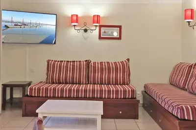 Coin salon dans l'établissement Résidence de vacances Domaine de Gascogne,grand appt 6 personnes 42m2